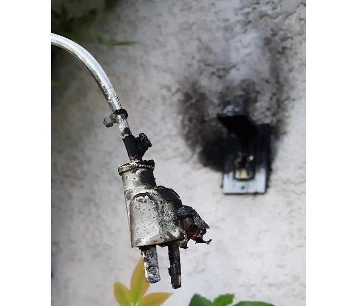 Burnt plug and outlet